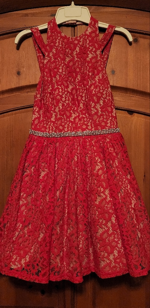 Red lace special occasion dress with pearl and rhinestone waist band.